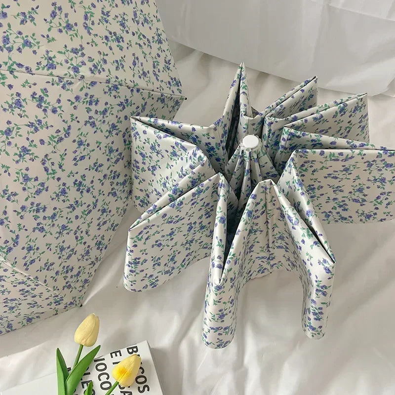Nuovo 1 Pezzo di Piccolo Ombrello a Fiori Blu, Stile Delicato, Protezione Solare, Ombrello Automatico Pieghevole a Tre per Tutte le Condizioni Meteorologiche