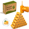 Sacchetti biodegradabili per deiezioni canine color arancione, profumati all'arancia, con dispenser e spessore rinforzato.