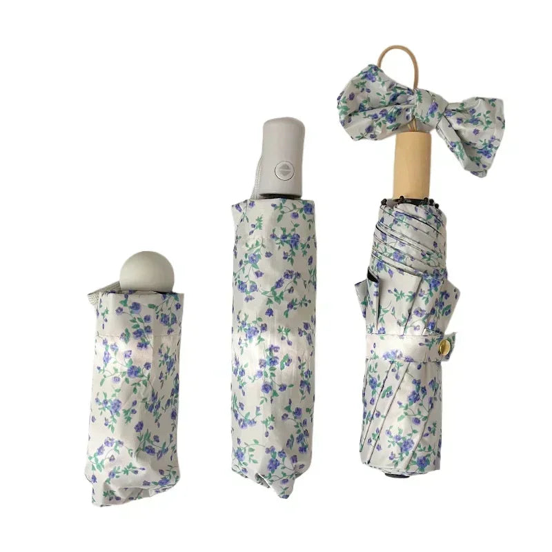 Nuovo 1 Pezzo di Piccolo Ombrello a Fiori Blu, Stile Delicato, Protezione Solare, Ombrello Automatico Pieghevole a Tre per Tutte le Condizioni Meteorologiche
